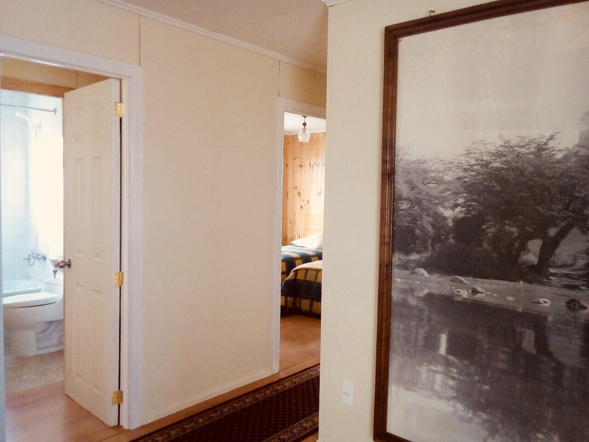 פורטו נטאלס Hostal Los Pioneros מראה חיצוני תמונה