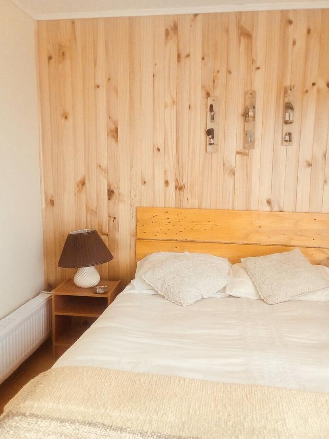 פורטו נטאלס Hostal Los Pioneros מראה חיצוני תמונה